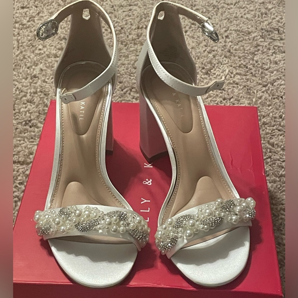 Brand new shoes. White. Perfect for a bride!